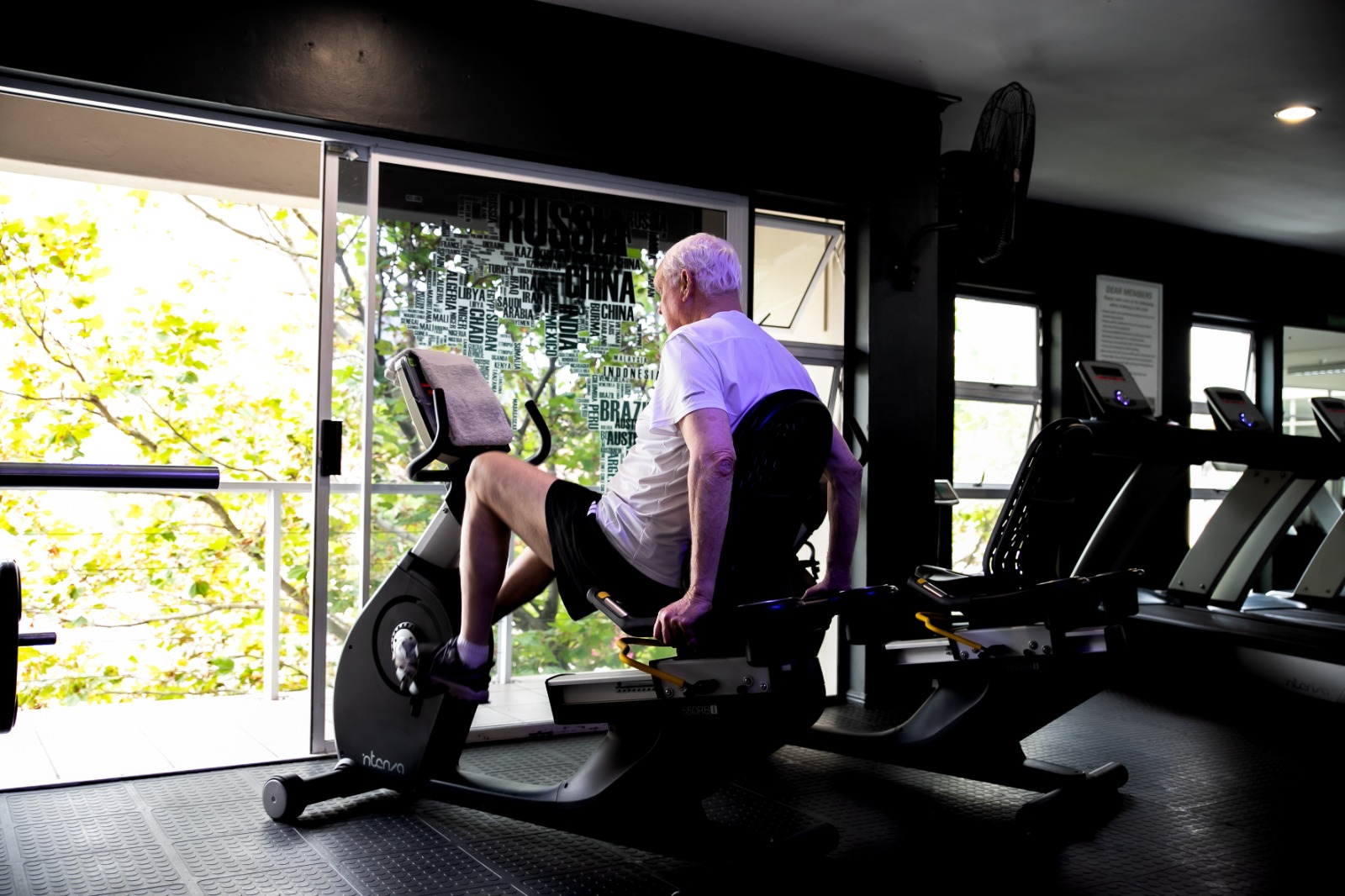elderly member enjoying a session on a recline bike