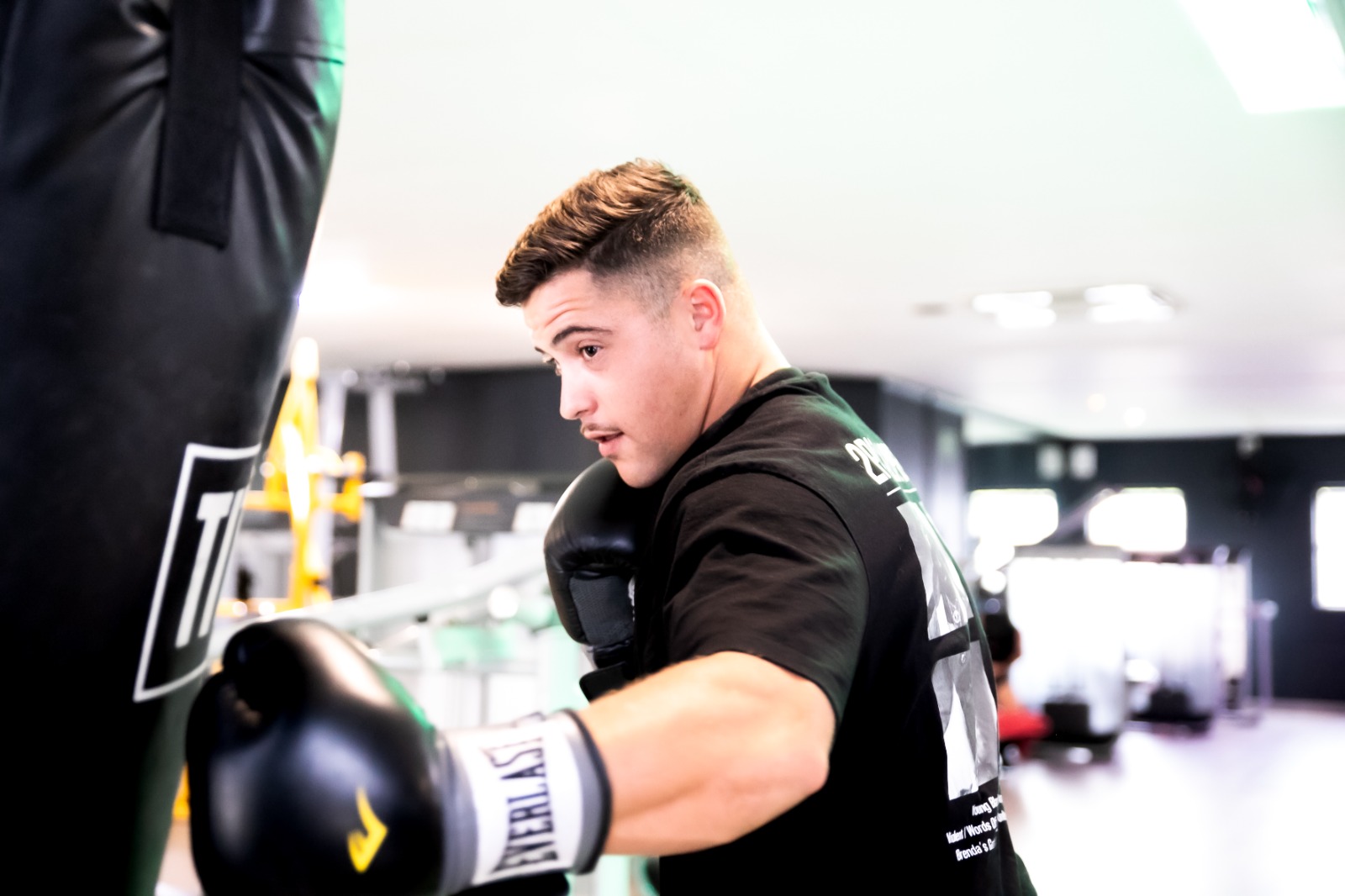 A left hook delivered onto a punching bag